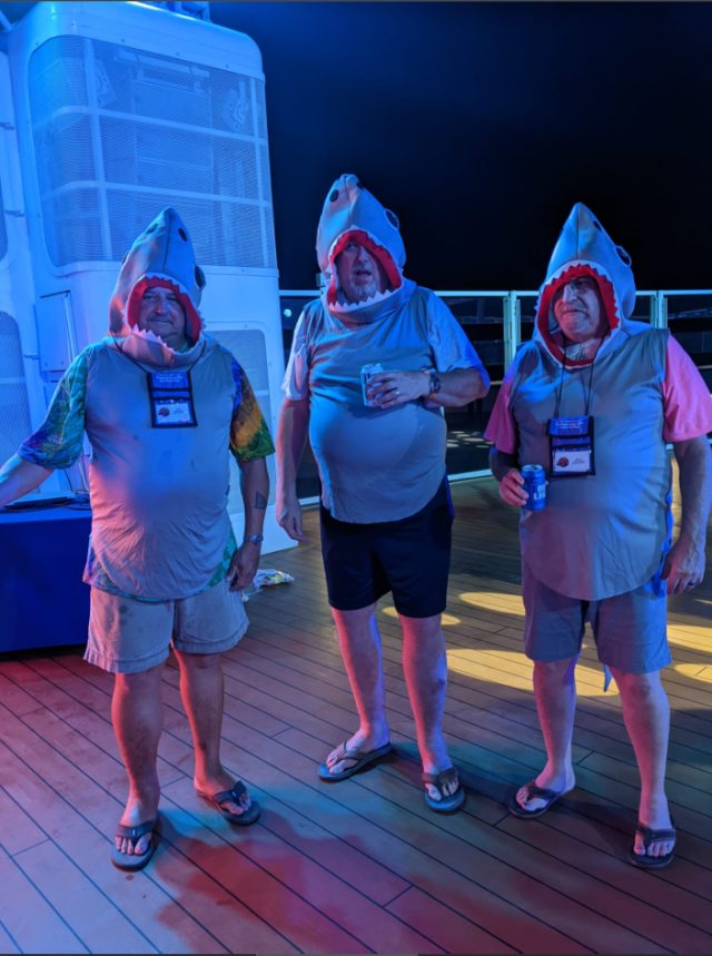 _2022-03-13_1400_Carribean_NorweiganJoy-SpiceH2O-3men-wearing-shark-costume