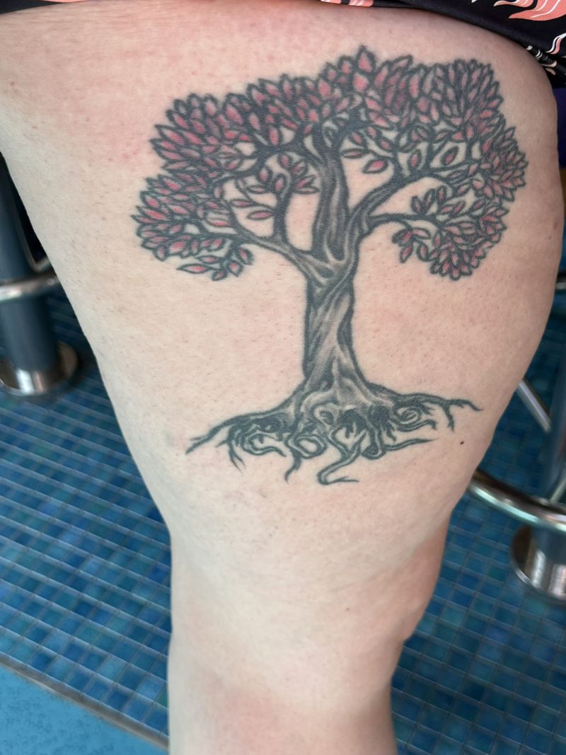 tattoo(Woman-RightLeg-tree-in-her-yard)